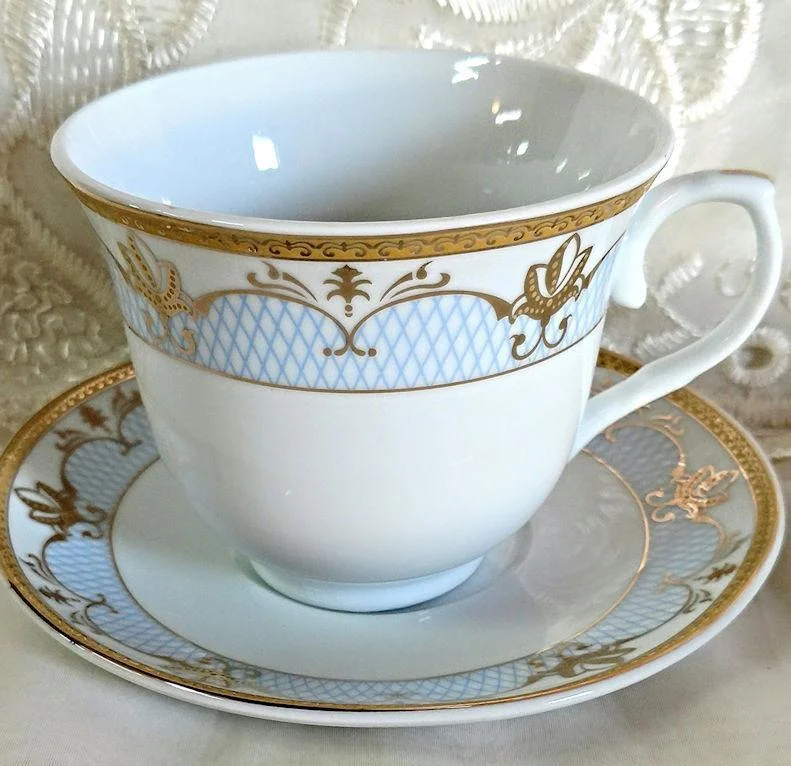 personalized mugs for birthdays and celebrations-Case of Cassandra 36 Gold and Pale Blue Wholesale Tea Cups and Saucers