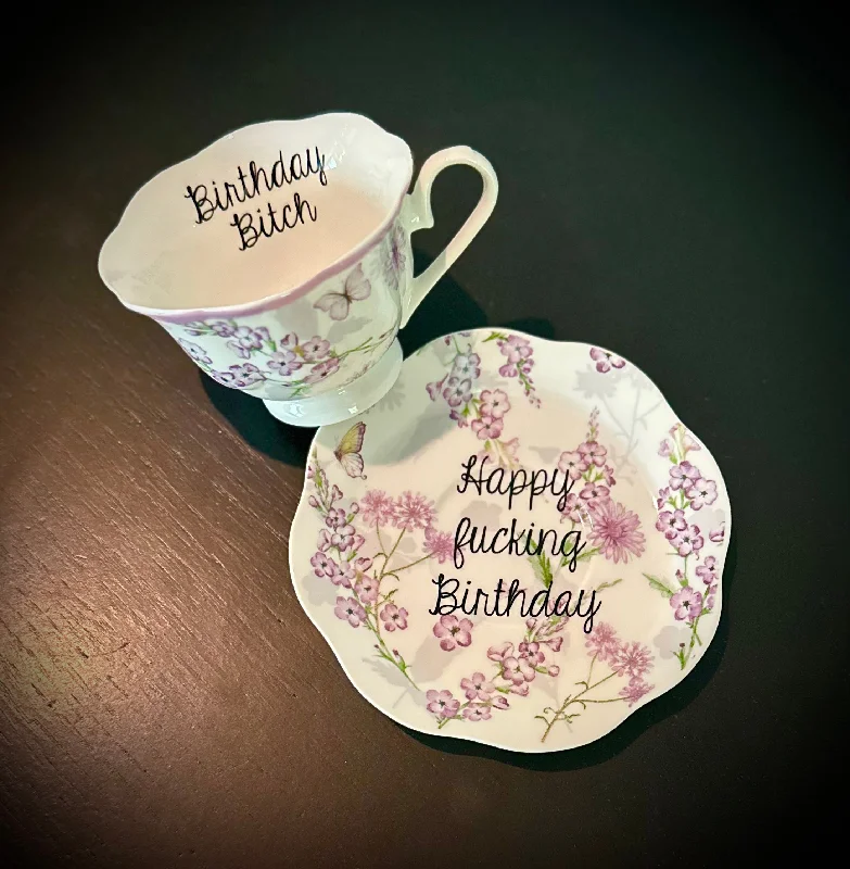 best mugs for winter morning tea-Happy fucking birthday. Birthday Bitch | vulgar purple lilac and butterflies tea cup and matching 'Bye' saucer set