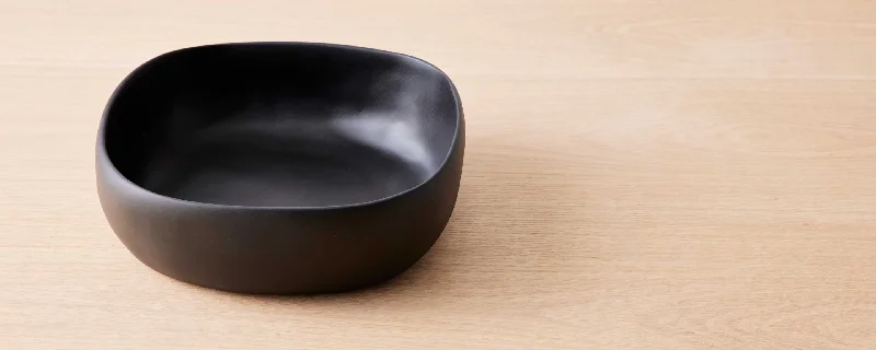 high-quality dinnerware set for guests-resin salad bowl black by tina frey