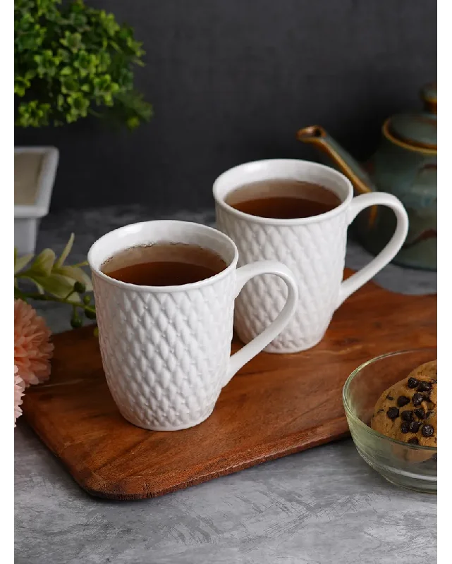 large coffee mugs for slow mornings-White Embossed Bone China Mugs | Set of 2